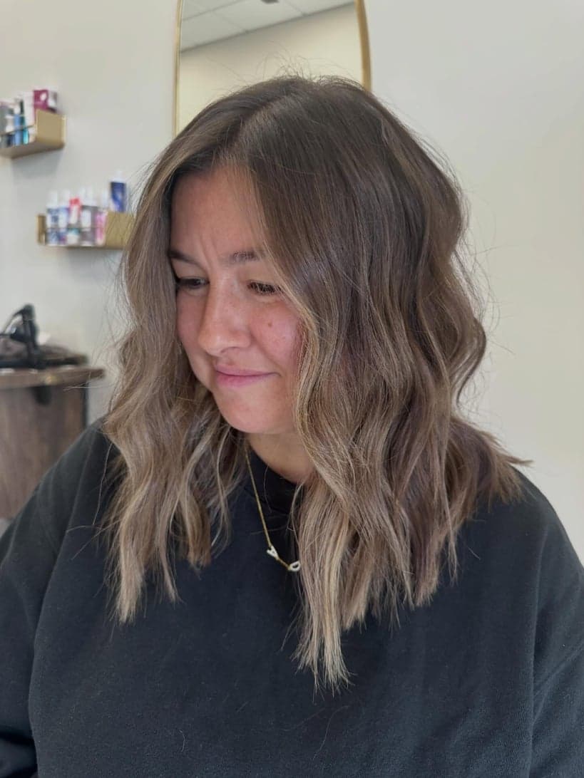 Low-maintenance soft brunette balayage on a fresh shoulder-length chop, front view — hair by Alchemy Loft