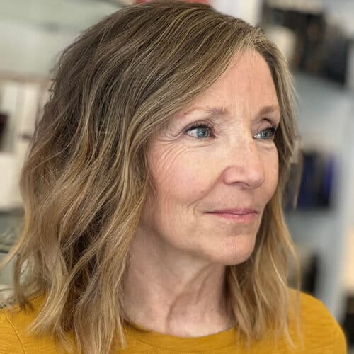 Soft blonde lob with face-framing pieces — hair by Alchemy Loft